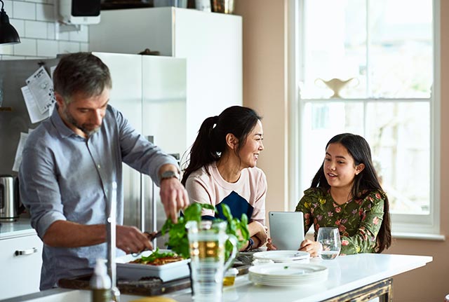 family preparing meal