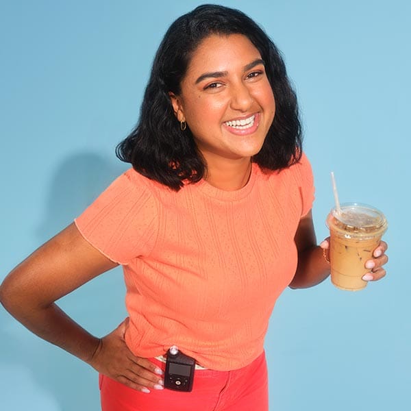 MiniMed Champion Samira holding coffee