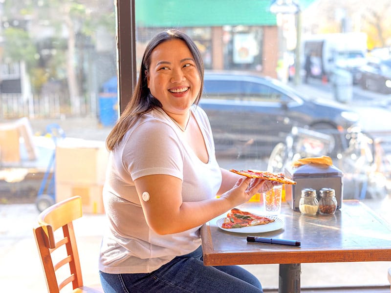 Girl eating a pizza